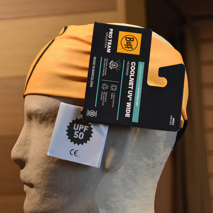 The Original BUFF® CoolNet UV® Wide Headband - Logo Yellow